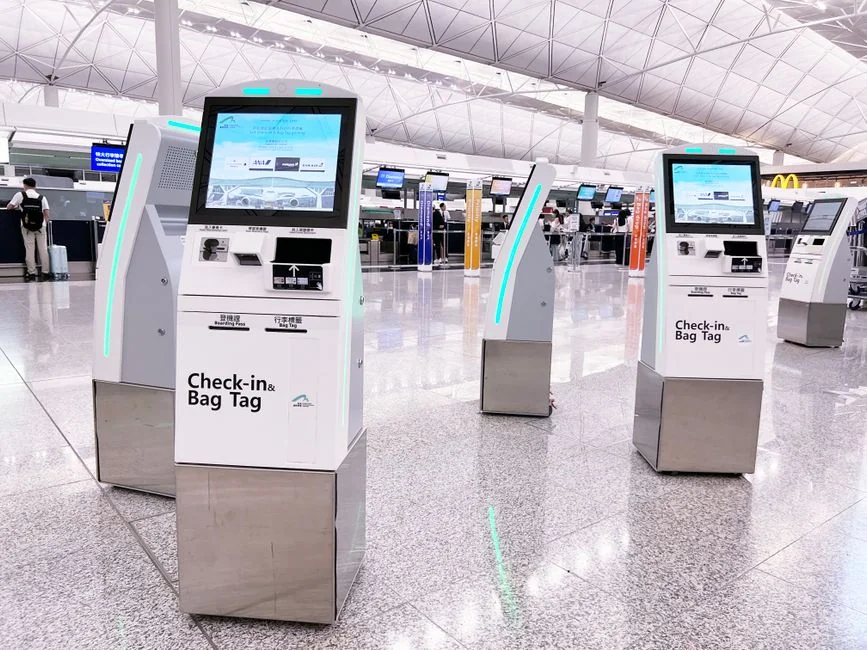 Modern check-in kiosks at Hong Kong International Airport's terminal. Efficient travel is enhanced by technology. - 人工智能领域专利布局指引a complete guide